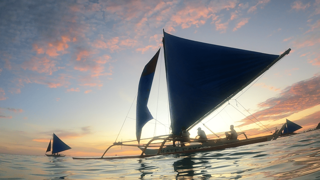 Paraw sailboat sailing into the Boracay sunset