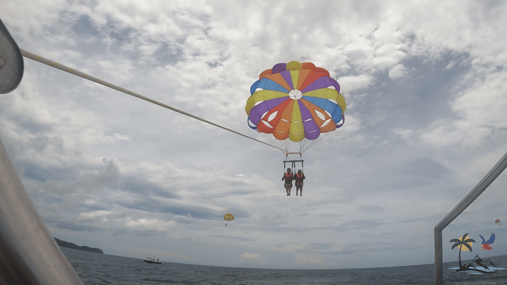 Parasailers lifting off the boat