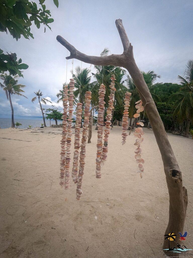 Sea shells hanging for picture ops in Cabugao Gamay