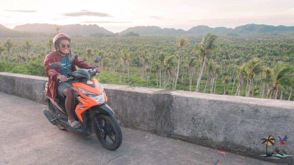 Me riding a motorbike in the coconut tree viewdeck