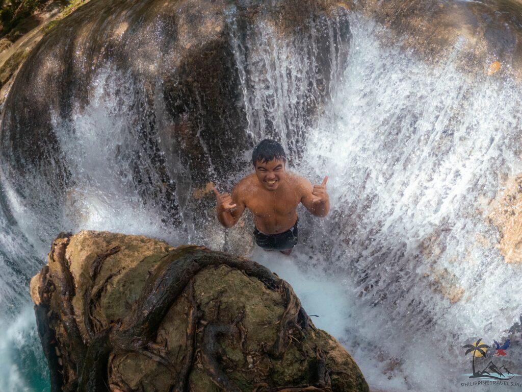 Me under the waterfall in Lagaan Falls
