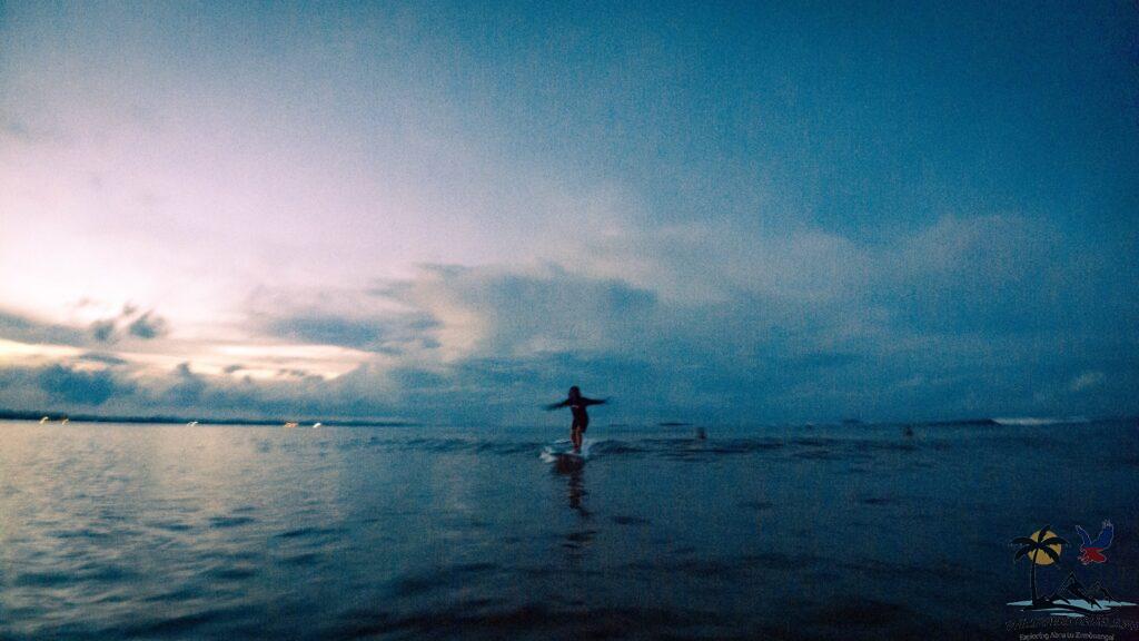 Person surfing in siargao