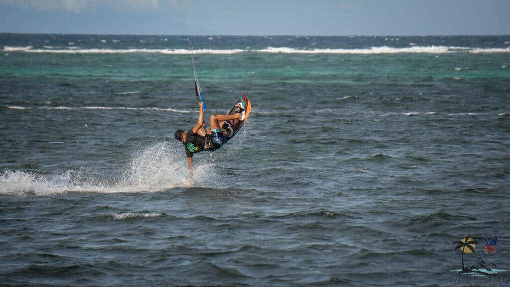 man doing flips in a kite surf