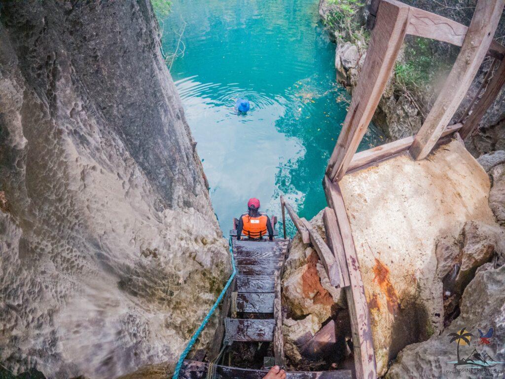 Person walking down the twin lagoon stairs