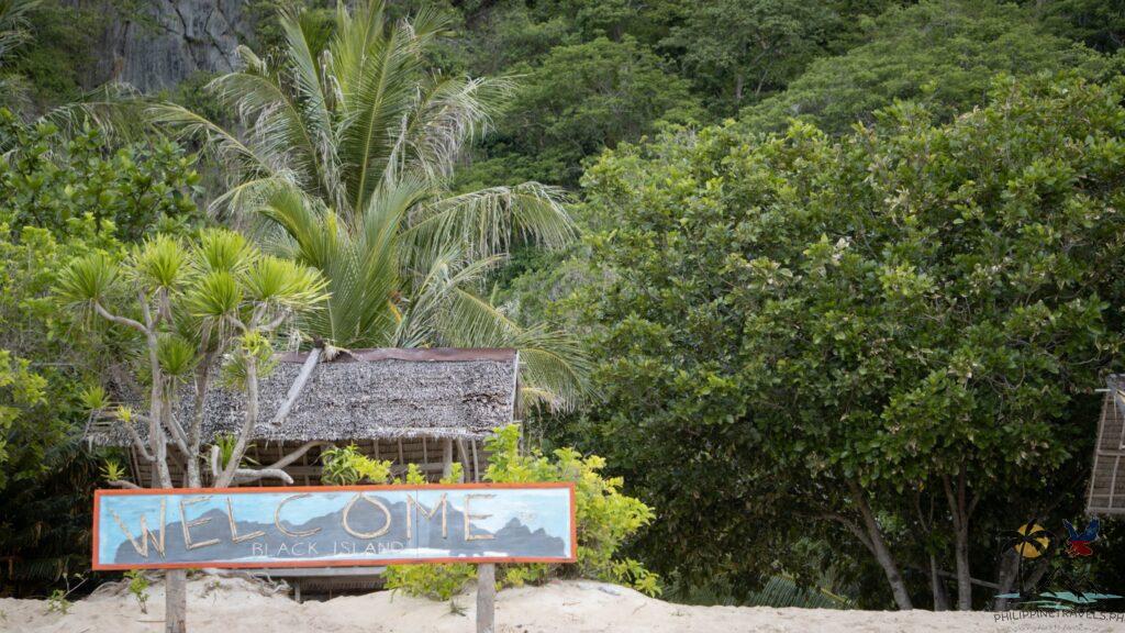 Welcome to black island sign