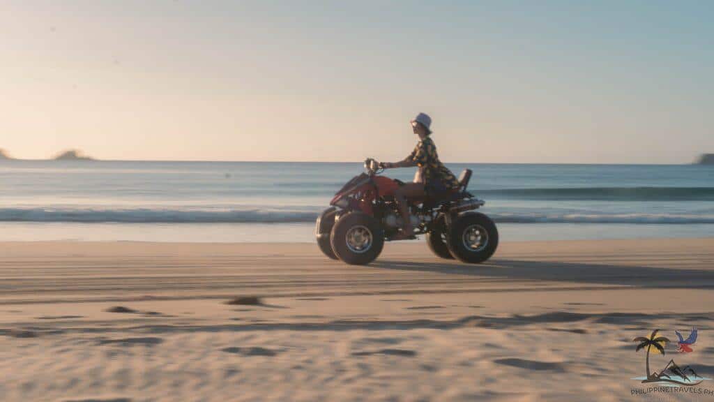 Someone riding an ATV in nacpan beach